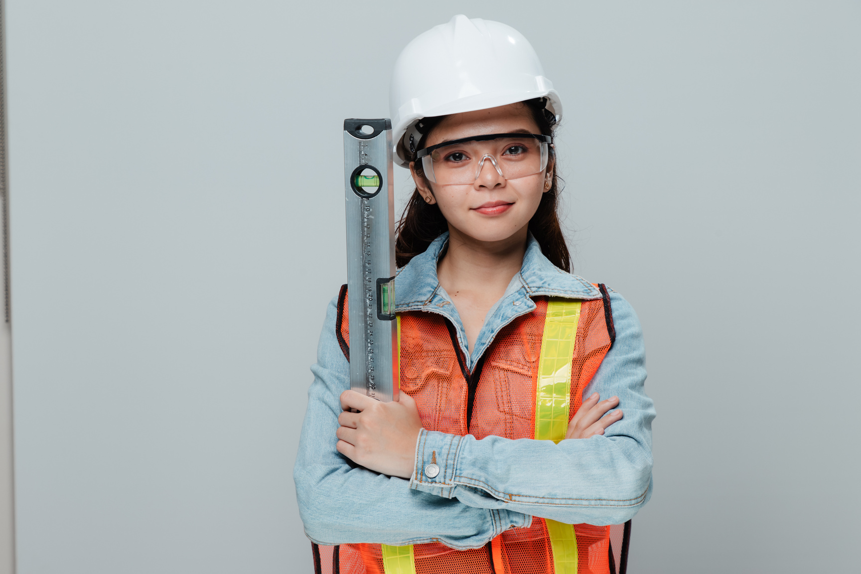 Female Engineer with Level